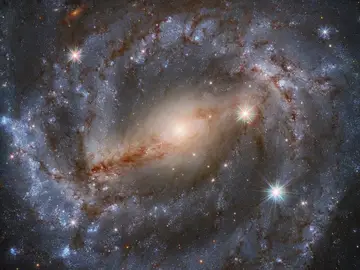 Imagen de la galaxia NGC 5643 captada por el telescopio espacial Hubble. Imagen de la galaxia NGC 5643 captada por el telescopio espacial Hubble.