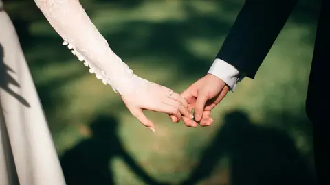 Pareja el día de su boda Pareja el día de su boda