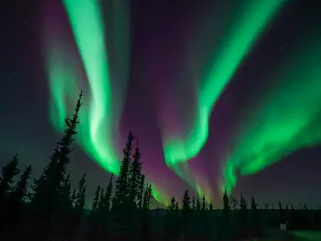 Uno de los efectos de las tormentas solares son las auroras boreales, como esta observada en Alaska. Uno de los efectos de las tormentas solares son las auroras boreales, como esta observada en Alaska.