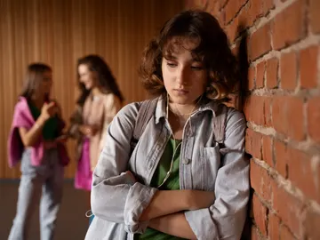 Una joven víctima de bullying Una joven víctima de bullying