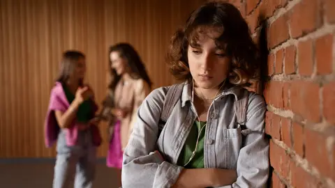 Una joven víctima de bullying Una joven víctima de bullying