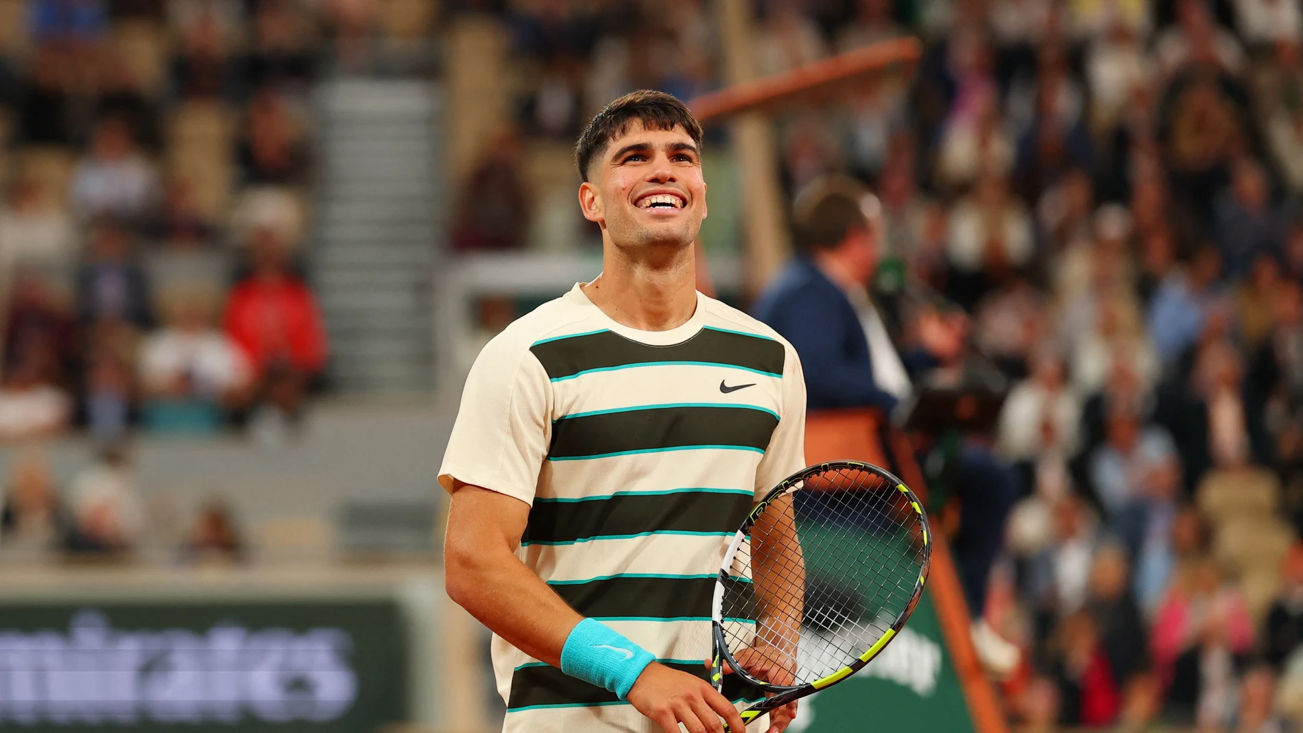 Carlos Alcaraz sonríe tras un punto ante Marozsan Carlos Alcaraz sonríe tras un punto ante Marozsan