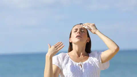 Mujer con calor Mujer con calor