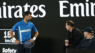 Andy Murray y Djokovic durante un partido en el Open de Australia