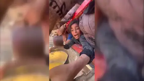 Niña desesperada pidiendo comida en Gaza Niña desesperada pidiendo comida en Gaza