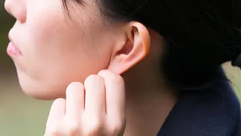 Masaje en la oreja Masaje en la oreja