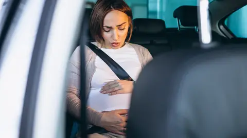 Una mujer embarazada Una mujer embarazada