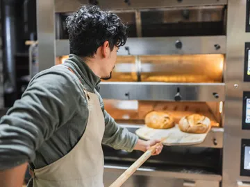 Panadero haciendo pan Panadero haciendo pan