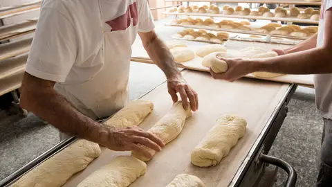 Panadero haciendo pan Panadero haciendo pan