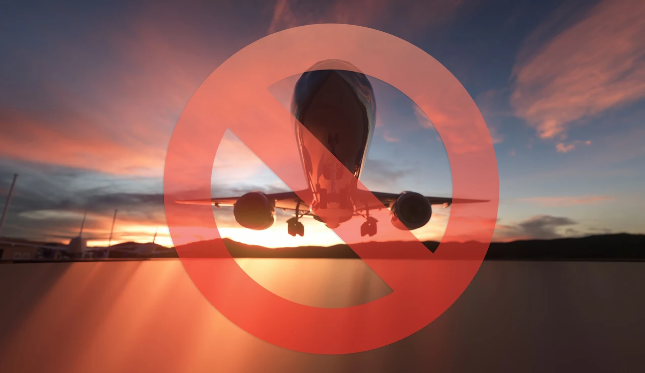 Avión con señal de prohibido