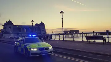 Imagen de archivo de un coche de policía de Wales del Sur. Imagen de archivo de un coche de policía de Wales del Sur.