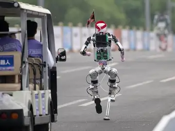 Los robos se imponen a los humanos en Pekín Los robos se imponen a los humanos en Pekín