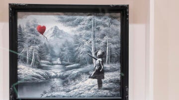 Imagen de la obra 'Ni&ntilde;a con globo' de Banksy