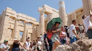 Turistas en el Acrópolis de Atenas Turistas en el Acrópolis de Atenas