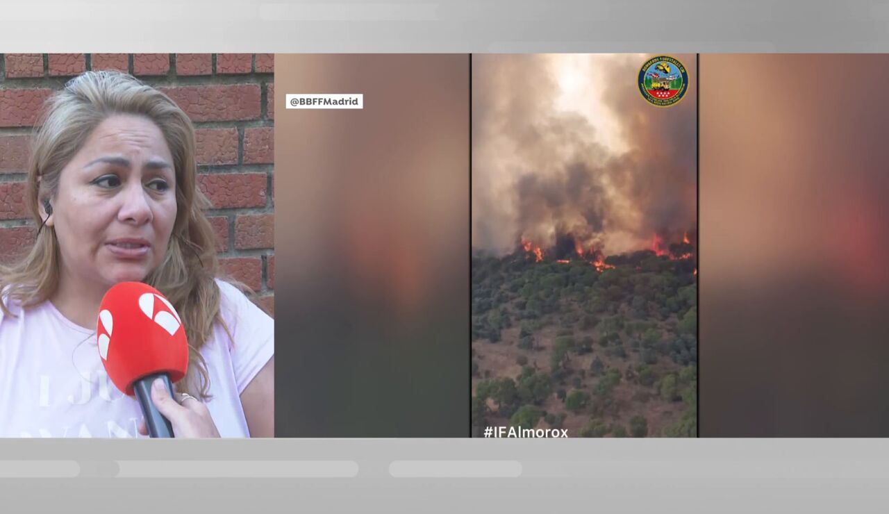 Una vecina llora tras su evacuaci&oacute;n por el incendio de Almorox