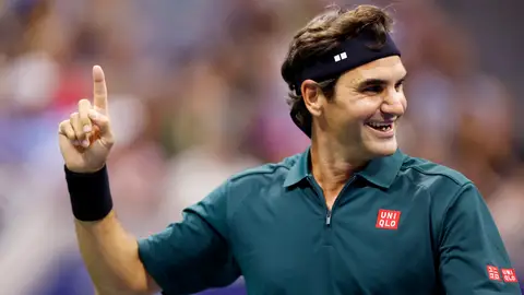Roger Federer celebra un punto en la Arthur Ashe Roger Federer celebra un punto en la Arthur Ashe