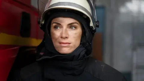 Mujer bombero Mujer bombero