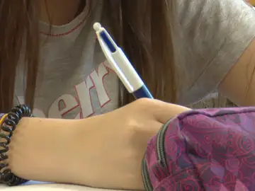 Imagen de una alumna en un aula Imagen de una alumna en un aula