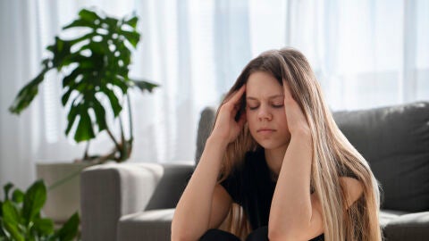 Mujer con dolor de cabeza