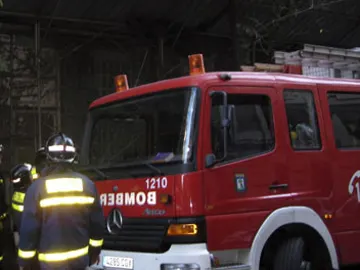 Bomberos en el lugar de un incendio Bomberos en el lugar de un incendio