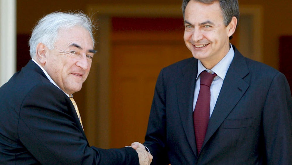 Zapatero con Strauss-Kahn