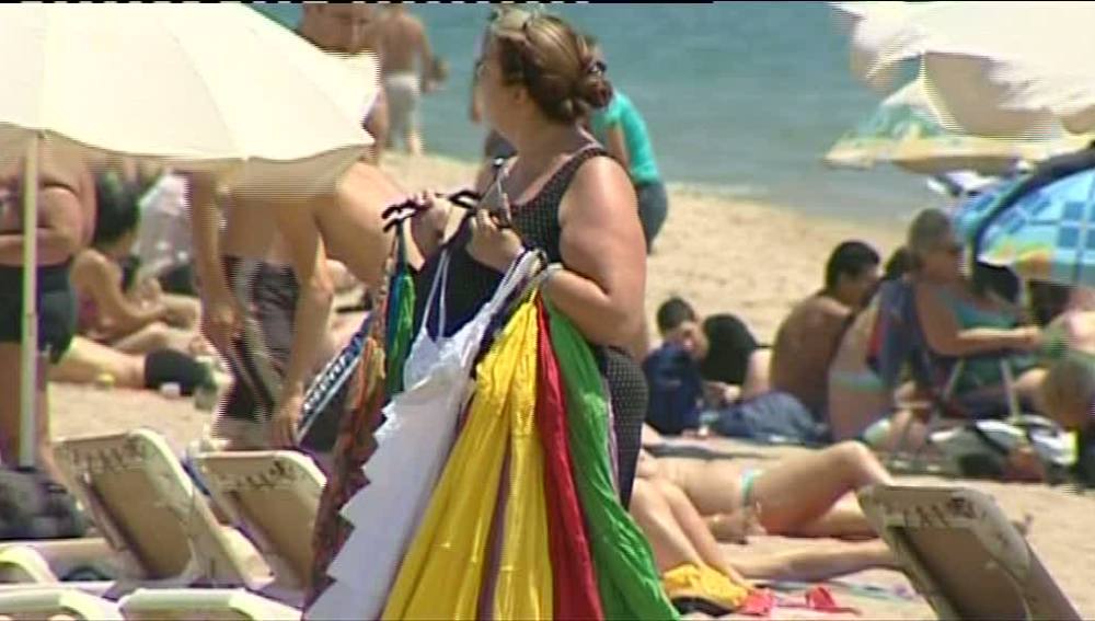 Venta ambulante en la playa