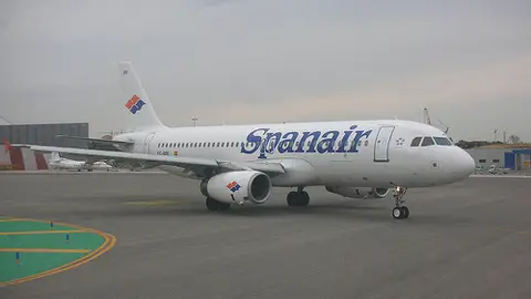 Un avión de Spanair despegando Un avión de Spanair despegando