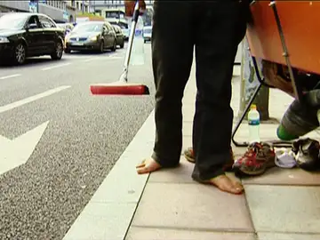 Mendigo en una calle Mendigo en una calle