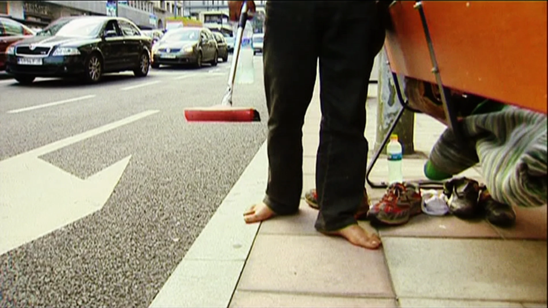 Mendigo en una calle Mendigo en una calle