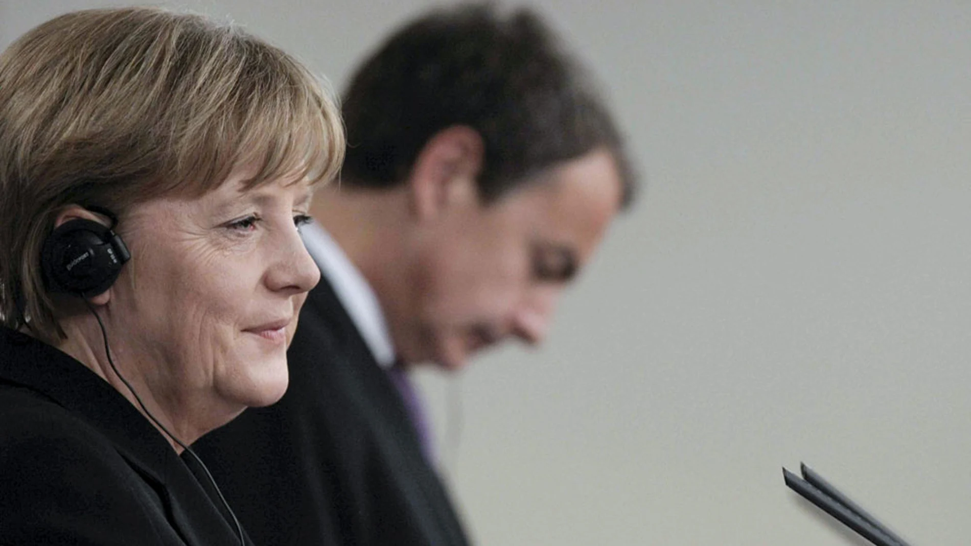 Angela Merkel junto a Zapatero Angela Merkel junto a Zapatero