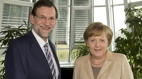 Mariano Rajoy junto a Angela Merkel Mariano Rajoy junto a Angela Merkel