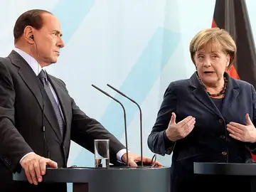 Merkel con Berlusconi Merkel con Berlusconi