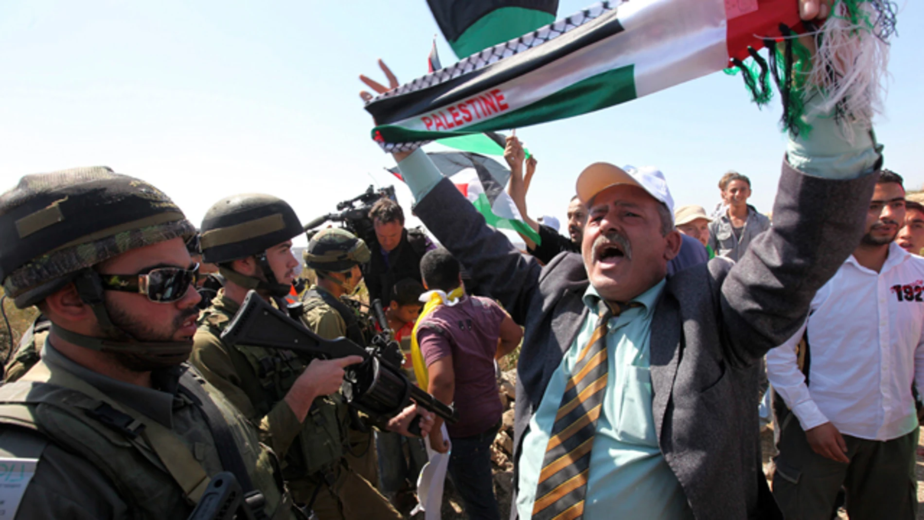 Un grupo de palestinos exigen que Palestina sea admitida como miembro de la ONU Un grupo de palestinos exigen que Palestina sea admitida como miembro de la ONU