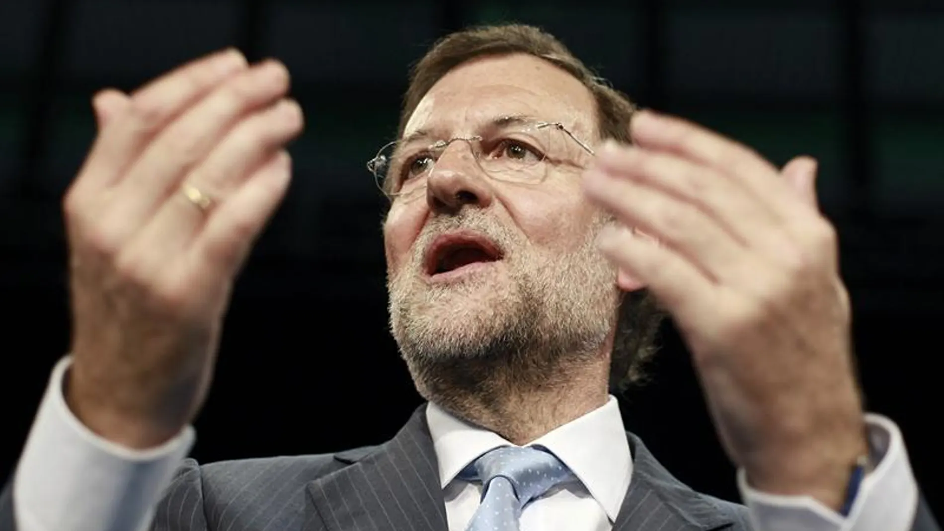 El presidente nacional del PP, Mariano Rajoy, tras su intervención en la clausura de la Convención Nacional