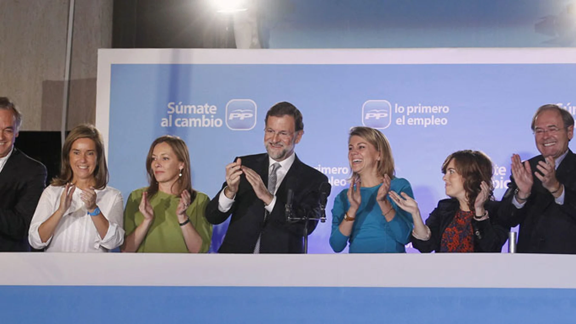 Mariano Rajoy, acompañado por compañeros de partido en Génova