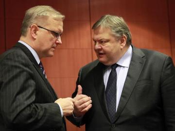 Olli Rehn conversa con Evangelos Venizelos