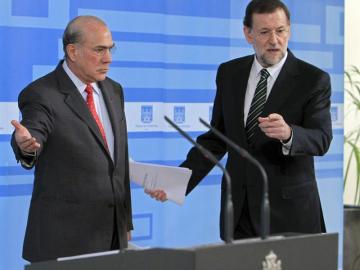Mariano Rajoy con el presidente de la OCDE