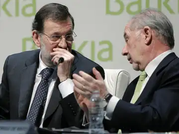 Rajoy conversa con Rodrigo Rato Rajoy conversa con Rodrigo Rato