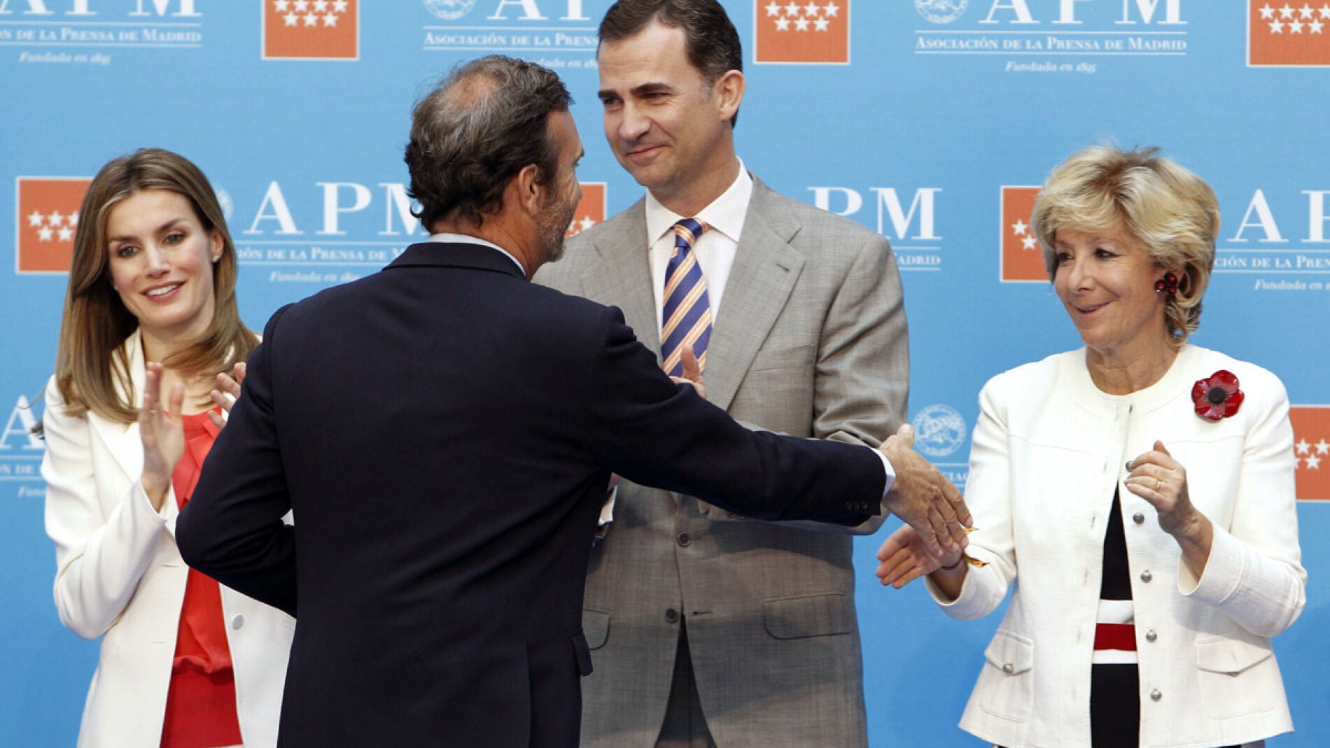 Do&ntilde;a Letizia y Don Felipe durante el acto