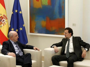 Mariano Rajoy y Joaquín Almunia