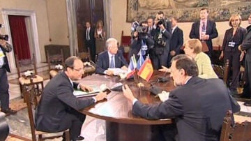 Rajoy con Merkel, Hollande y Monti