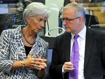 Christine Lagarde charla con Olli Rehn Christine Lagarde charla con Olli Rehn