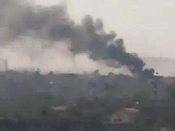 Una columna de humo causada por las explosiones en Siria Una columna de humo causada por las explosiones en Siria