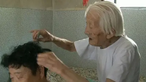 Peluquero de Pekín Peluquero de Pekín