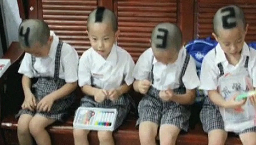 niños chinos con numeros en la cabeza