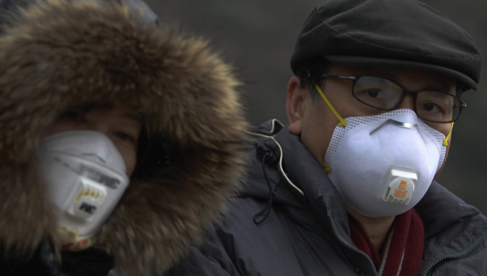 Mascarillas en Pekín frente a la alta contaminación