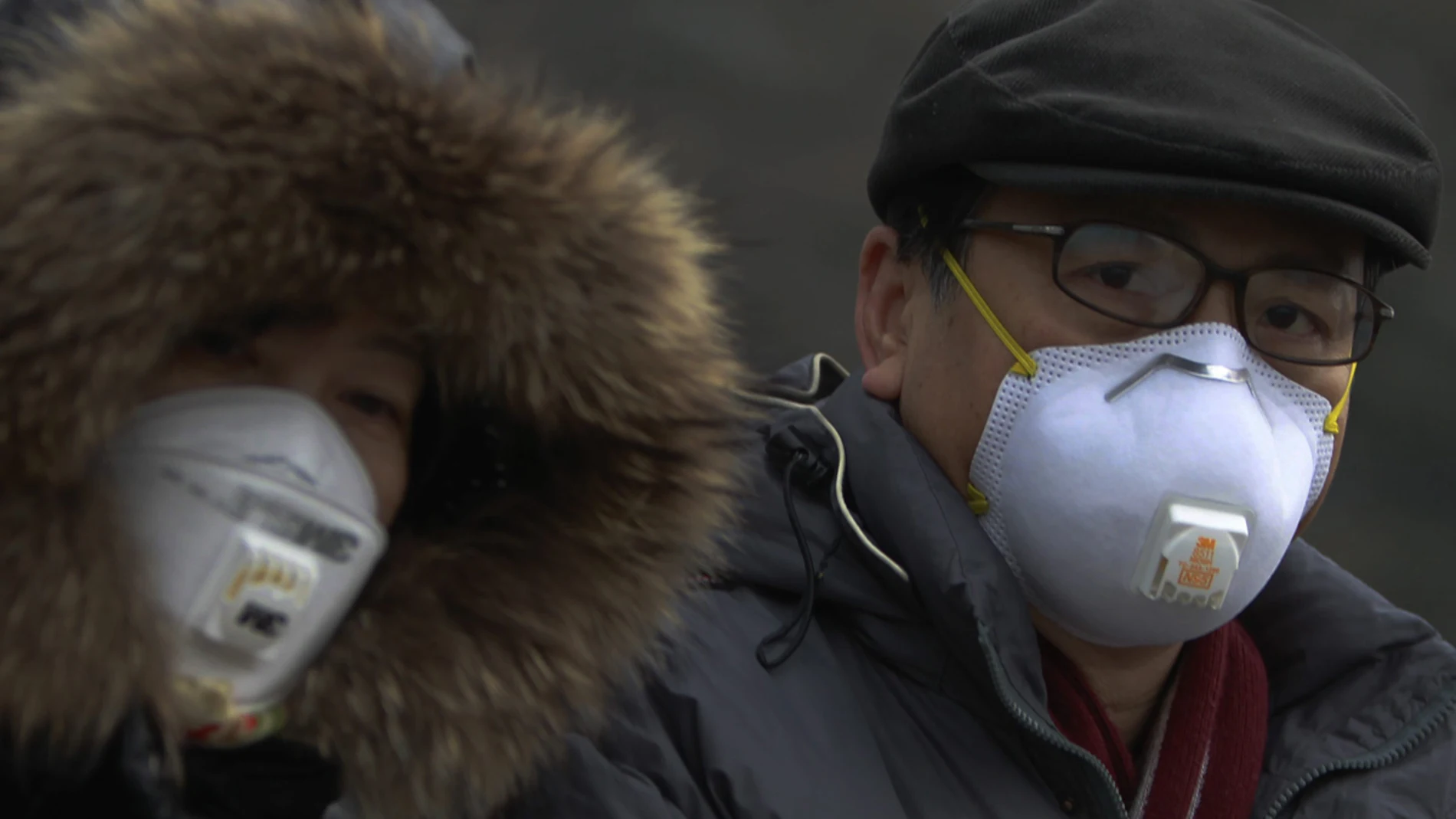 Mascarillas en Pekín frente a la alta contaminación Mascarillas en Pekín frente a la alta contaminación