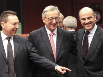 Yannis Stournaras, Jean-Claude Juncker y Luis de Guindos
