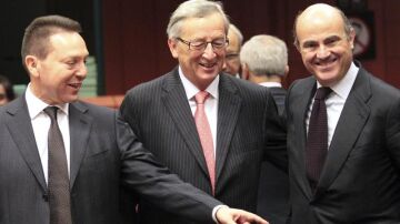 Yannis Stournaras, Jean-Claude Juncker y Luis de Guindos