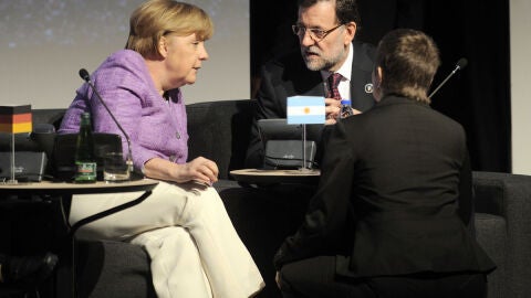Merkel y Rajoy, reunidos en Chile